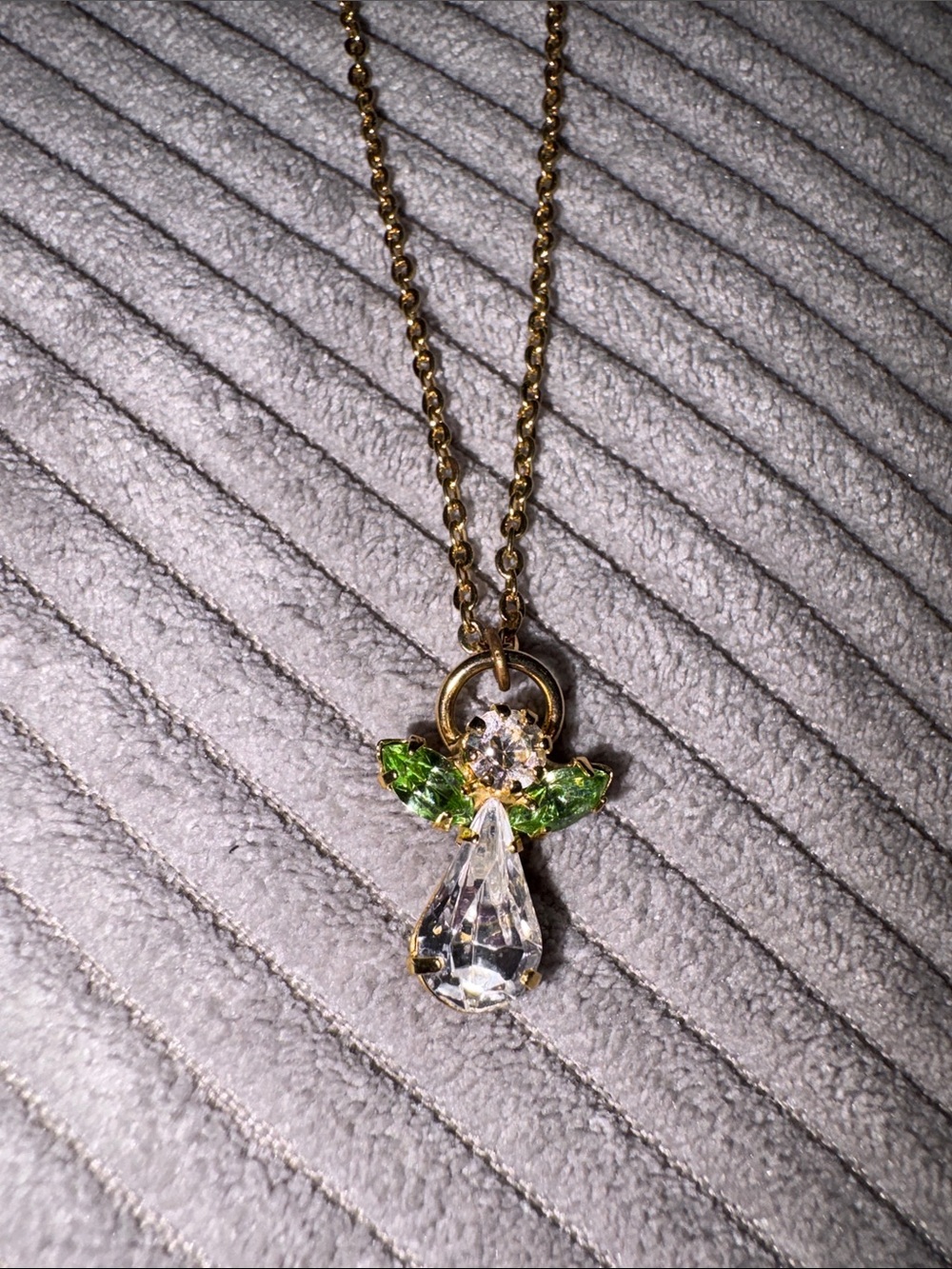 21-Gold Angel Pendant Necklace with Clear and Green Stones_August birthstone